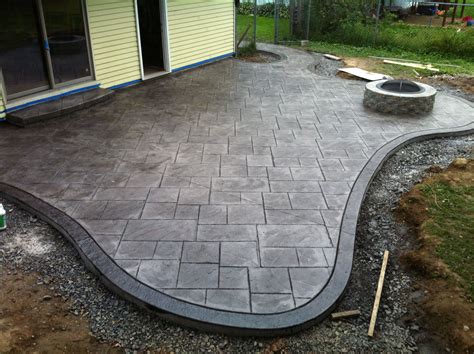 Stamped concrete patio and fire pit. Large ashlar pattern with seamless ...