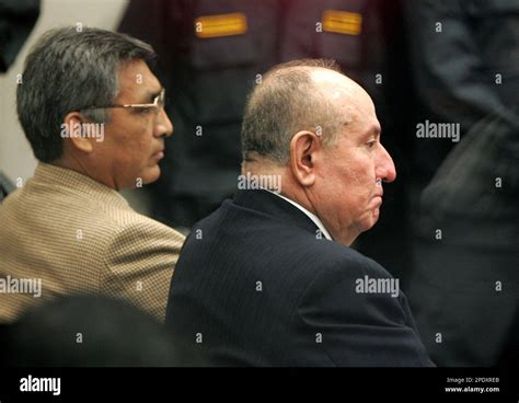 Peru's former armed forces commander Gen. Gen. Nicolas Hermoza, right, listens at the start of ...