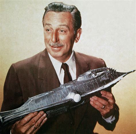 Walt Disney holding the scale model of the Nautilus from "20,000 LEAGUES UNDER THE SEA" (1954 ...