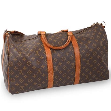 Sold Price: Vintage Louis Vuitton Duffle Bag - June 2, 0120 4:00 PM EDT