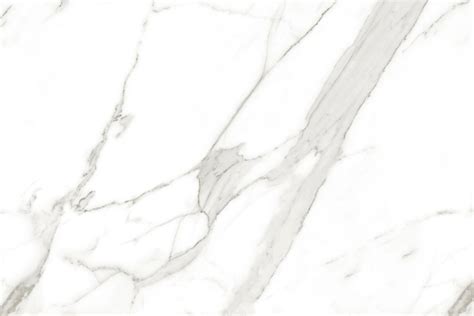 Experience the Luxury of Calacatta Oro Marble -Grande Marble