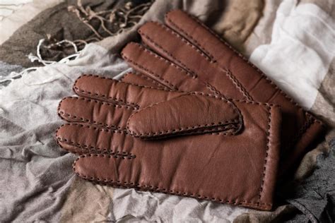 Premium Photo | Brown leather gloves