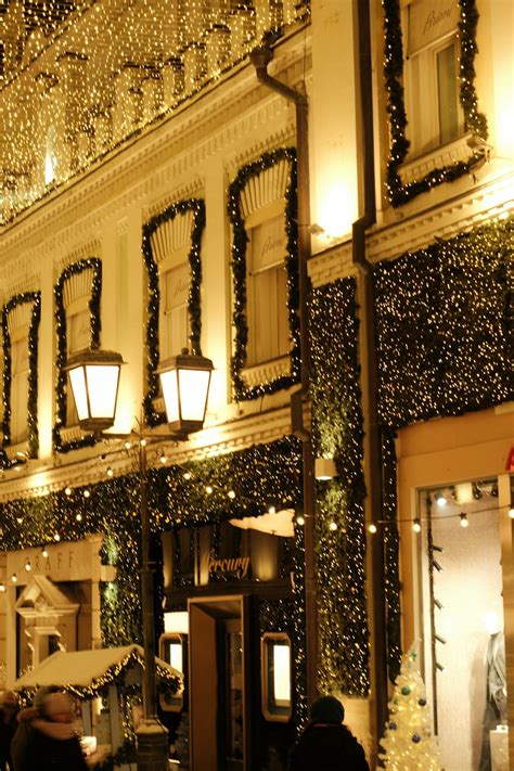 A building with christmas lights and decorations on it photo – Free ...