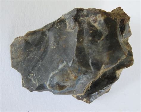 Archaeology of Portable Rock Art: A hafted flint feline head with ...