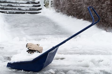 Big Snow Shovel Full Of Heavy Icy Snow Stock Photo - Image: 48567086