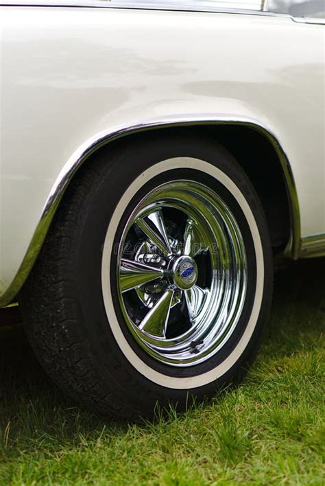 Vintage Car Wheel in Shiny Chrome Color Editorial Stock Photo - Image of colors, wheels: 158656348