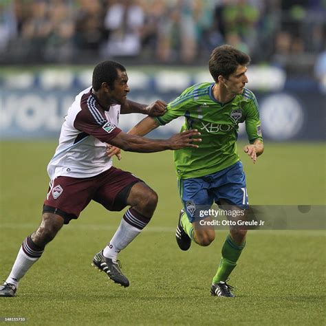 Marvell Wynne of the Colorado Rapids battles Alvaro Fernandez of the ...