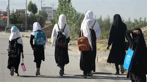 Afghans try to divine Taliban plan as girls' schools open, then close ...