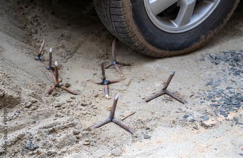 Spikes to puncture the tires of Russian military vehicles during the war Stock Photo | Adobe Stock