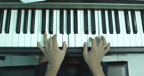 Top view, Fingers pressing the keys on the piano. Play piano at home. 4871635 Stock Video at ...