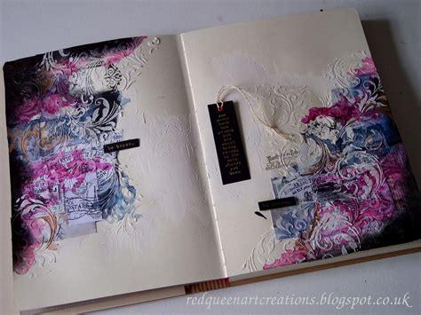 Mixed media collage art journal pages, in magenta pink, blue and gold watercolour. Black soot ...