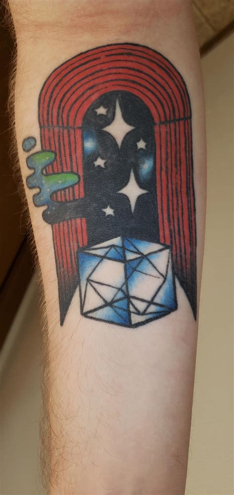 Not necessarily a band tattoo, but I took TesseracT's tesseract and ...