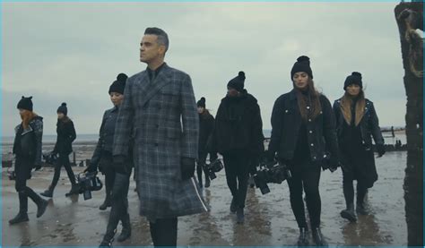 Robbie Williams Rocks Thom Browne Plaid Coat for 'Love My Life' Music Video