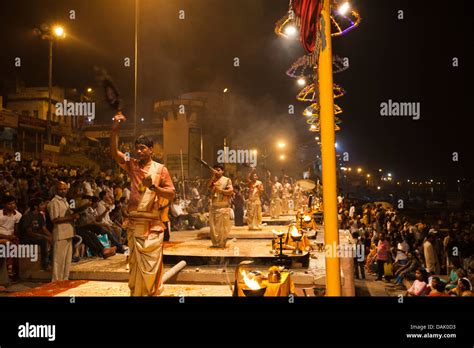 Pilgrims performing aarti at a ghat, Ganges River, Varanasi, Uttar ...