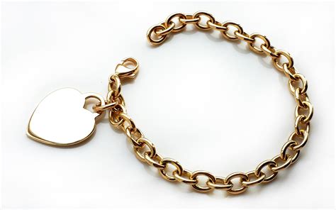 Tiffany & Co. 18k Gold Heart Tag Charm Bracelet, 7½ inches - Bloomsbury ...