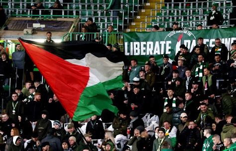 Celtic fans defy club to fly Palestine flags in Champions League match ...