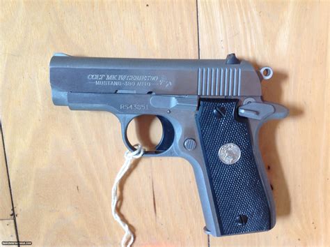 COLT MUSTANG + 2, 380 CAL. STAINLESS STEEL, NEW UNFIRED IN COLT PICTURE BOX