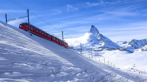 Download Train Swiss Alps Winter Landscape Wallpaper | Wallpapers.com