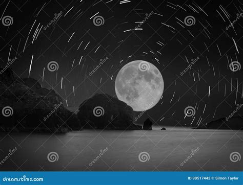 Moon and Star Trails Over the Sea Stock Photo - Image of field, clear: 90517442