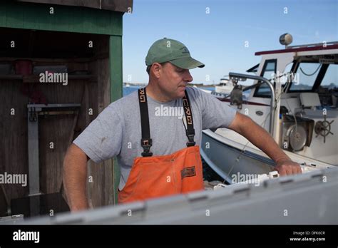 Lobsterman Eric Emmons drives his Maine lobster boat out Stock Photo - Alamy