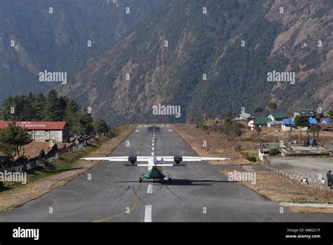 Departing aircraft at Lukla Airport, Lukla, Nepal Stock Photo - Alamy