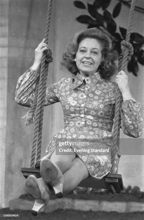 English actress and singer Diana Coupland on a swing, UK, 1st... News ...