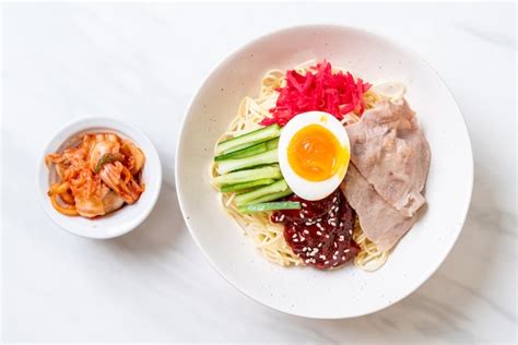 Premium Photo | Bibim naengmyeon - korean cold noodles