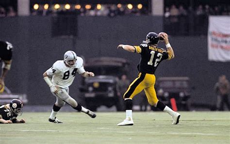 Pittsburg Steelers quarterback Terry Bradshaw prepares to unload a pass during the 1972 AFC ...