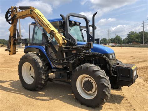 NEW HOLLAND TS110 FARM TRACTOR, VIN/SN:203113B - MFWD, (2) REMOTES, CAB, A/T, 18.4-30 REAR TIRES, 13