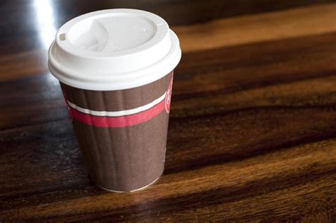 Free Image of Closed brown takeaway coffee cup | Freebie.Photography