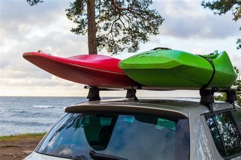 How To Strap Two Kayaks To A Roof Rack | SeaKayakExplorer