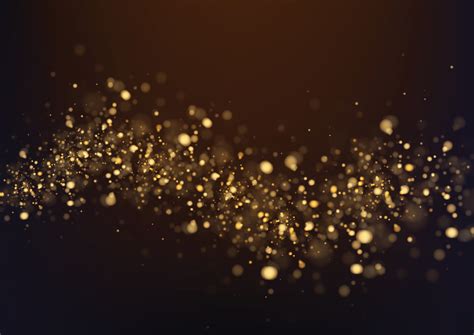 Gold glitter texture isolated with bokeh on background. Particles color Celebratory. Golden ...