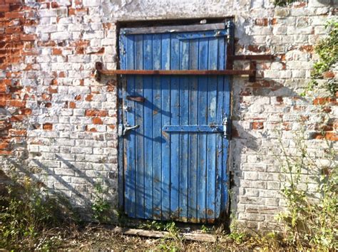 blue barn door | Tall cabinet storage, Doors, Blue barns