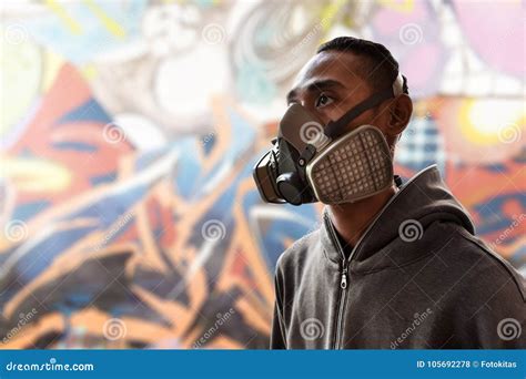 Graffiti Artist Wearing a Gas Mask Stock Photo - Image of outdoor ...