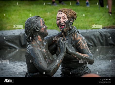 Two women mud wrestling at a mud fighting competition at The LowLand ...