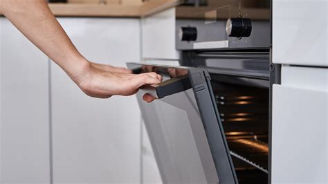 Why You Should Be Scrubbing Your Oven With A Dishwasher Tablet