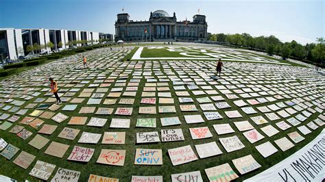 Photo: placards displayed during online climate change protest in Germany