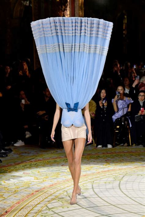 Viktor & Rolf makes strong case for upside down, sideways and floating ball gowns - ABC News