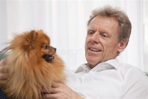 Happy Senior Man with His Dog Stock Image - Image of male, happy: 173123179