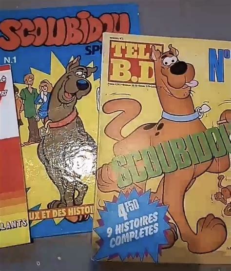 three children's books, including scooby and the big bad show are on display