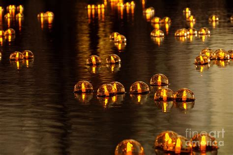 Candles In Water Photograph by Gloria Pasko