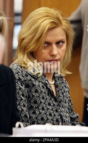 Dina Matos McGreevey looks across the court room as she leaves for a lunch break during the ...