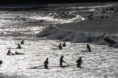 young athletes practising the water sport of surfing 21546145 Stock ...