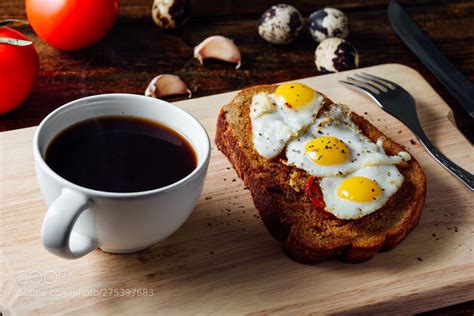 Breakfast with Cup of Coffee and Toast Breakfast with Cup of Coffee and Toast with Fried Eggs ...