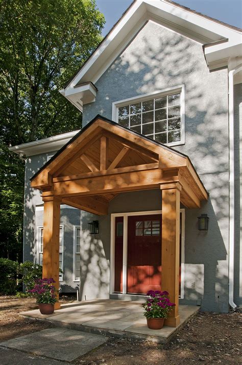 Timber frame portico with gable roof. Designed and built by Georgia Front Porch. | House with ...