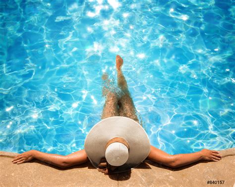 Woman Relaxing In The Pool - stock photo 840157 | Crushpixel