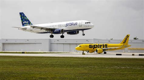 Justice Department sues to block JetBlue merger with Spirit Airlines ...