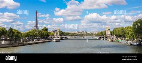 The Eiffel Tower and Pont Alexandre III at night in Paris, France Stock ...