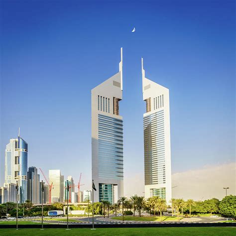 Emirates Towers in Dubai Photograph by Alexey Stiop - Pixels