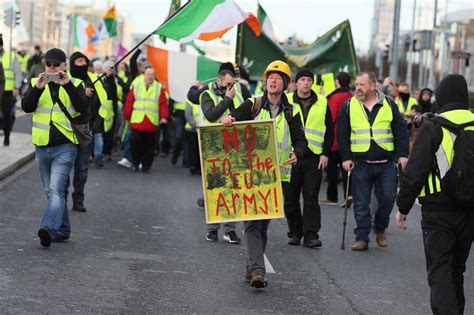 Hundreds take to Dublin streets in 'yellow vest' protest against ...